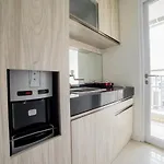 Modern 1BR Apartment Near Cihampelas at Parahyangan Residence By Travelio